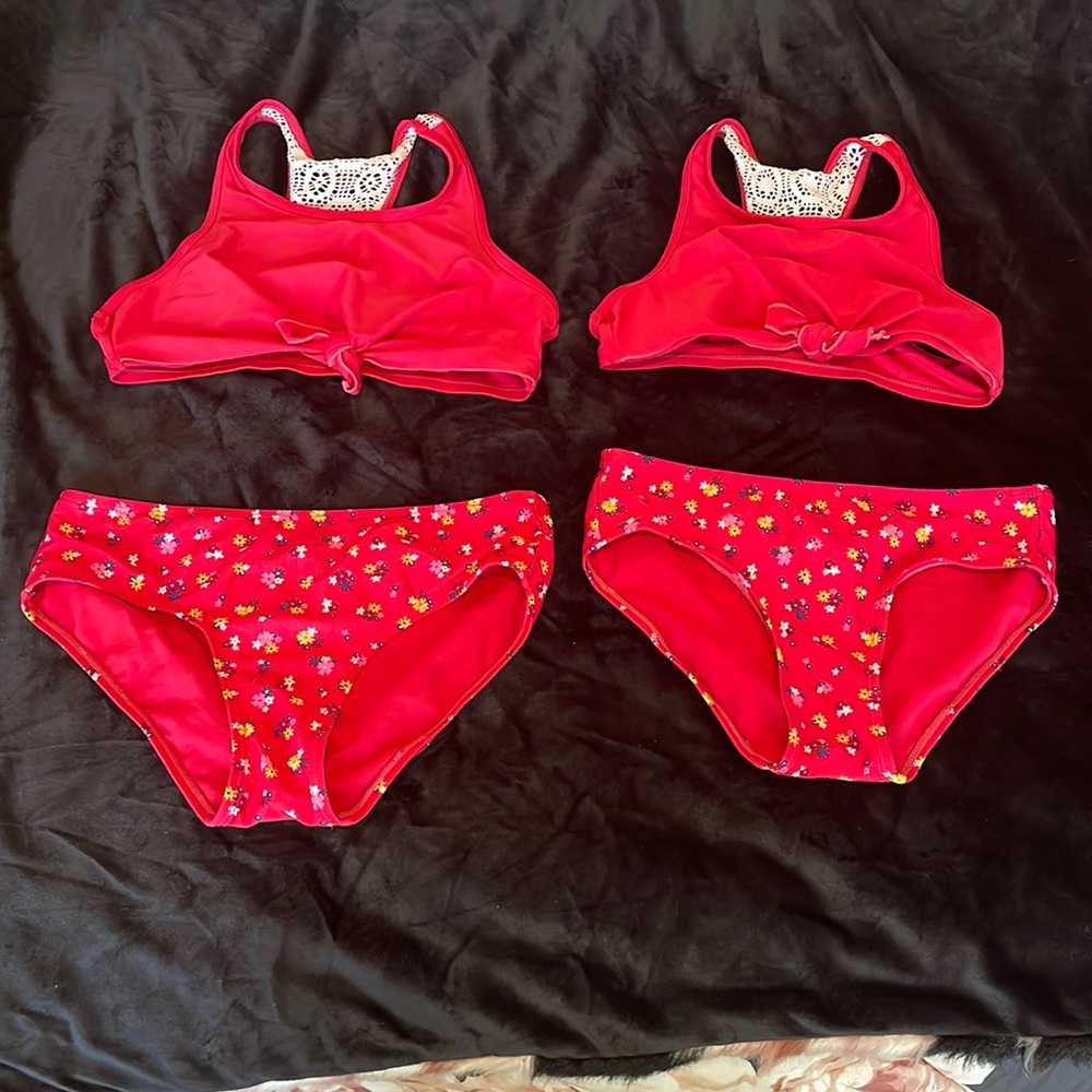 Two pairs of twin bathing suits from justice